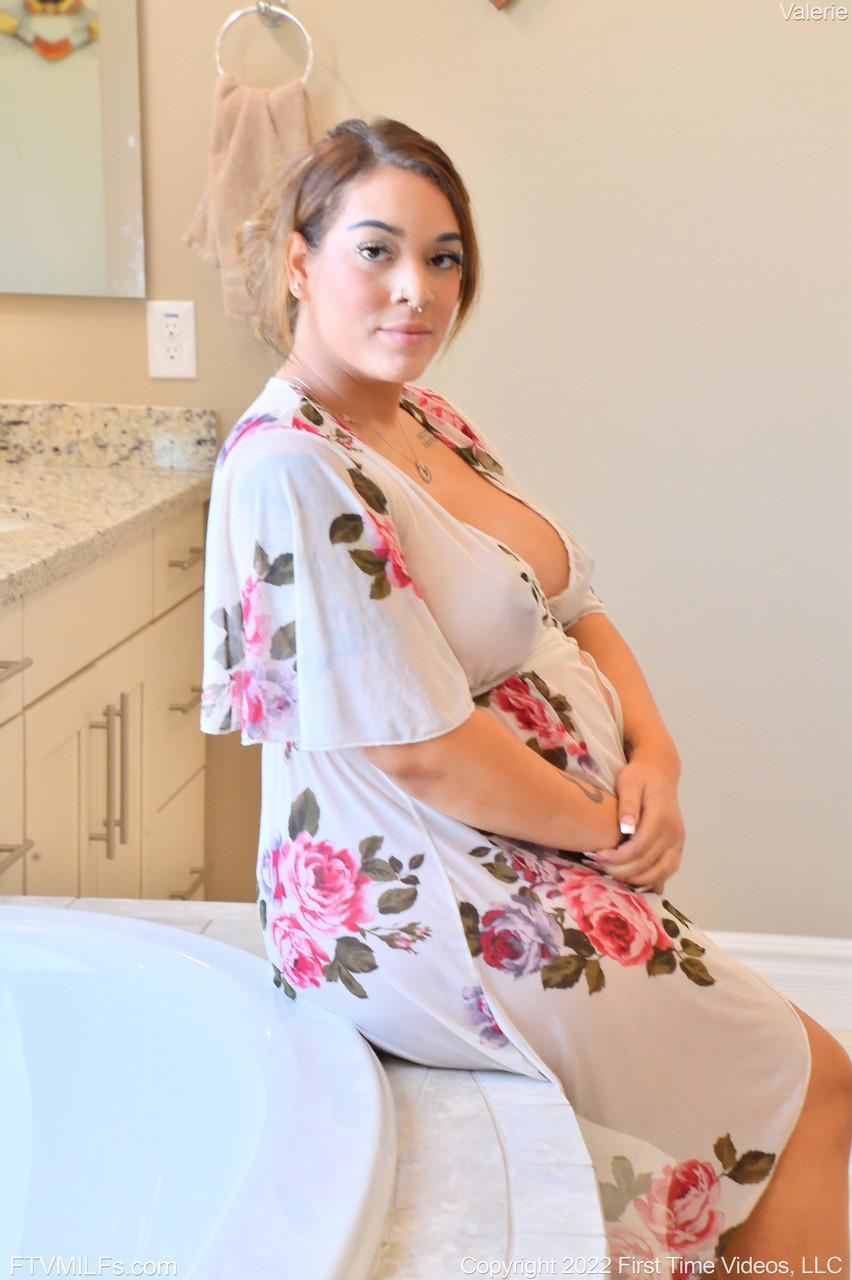 Pregnant MILF Valerie shows her swollen tits & toys herself in the bathtub(1)