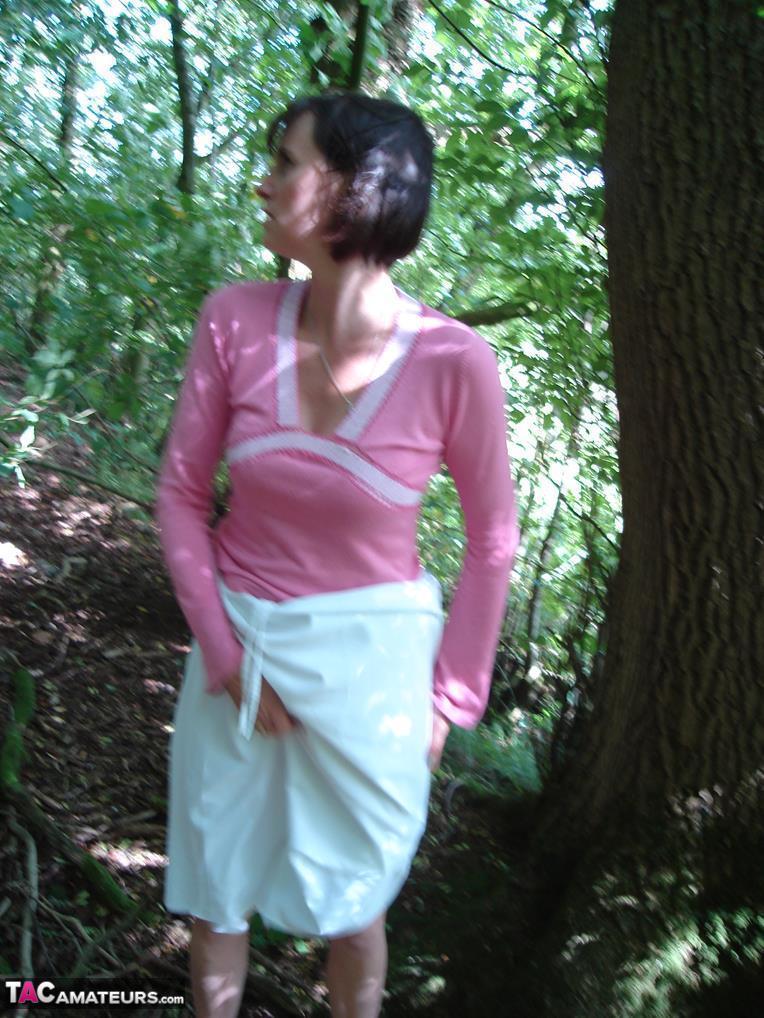 Older woman Slut Scot Susan gives a blowjob in the woods after baring her ass(6)