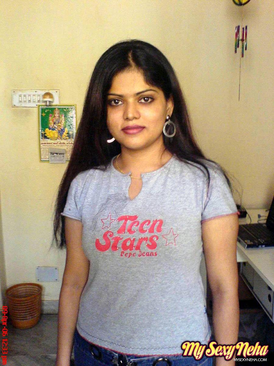 Petite Indian girl uncups big naturals after removing blue jeans(1)