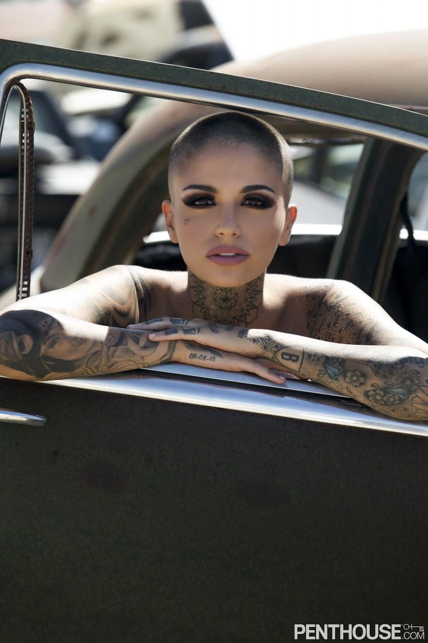 Bald inked babe Leigh Raven flaunts her small boobs and poses nude outdoors(12)