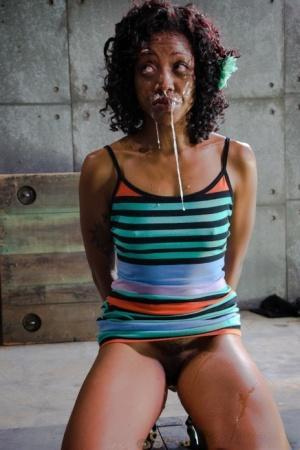 Blindfolded ebony girl Lotus Lain tied to chair for forced deepthroat & facial