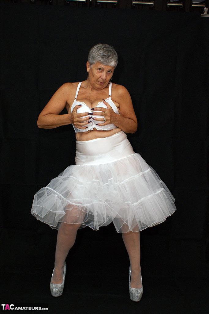 Brazen plump granny Savana flashes panty upskirt in tutu & sparkly high heels(15)