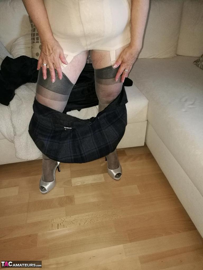 Old granny dildos her pussy in sheer nylons and garter ensemble(12)