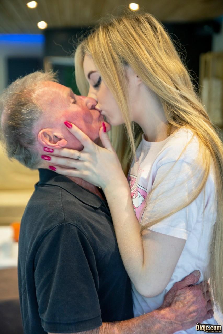 Teenage vixen Baby Kxtten	gets fucked by a tiny grandpa while standing(3)