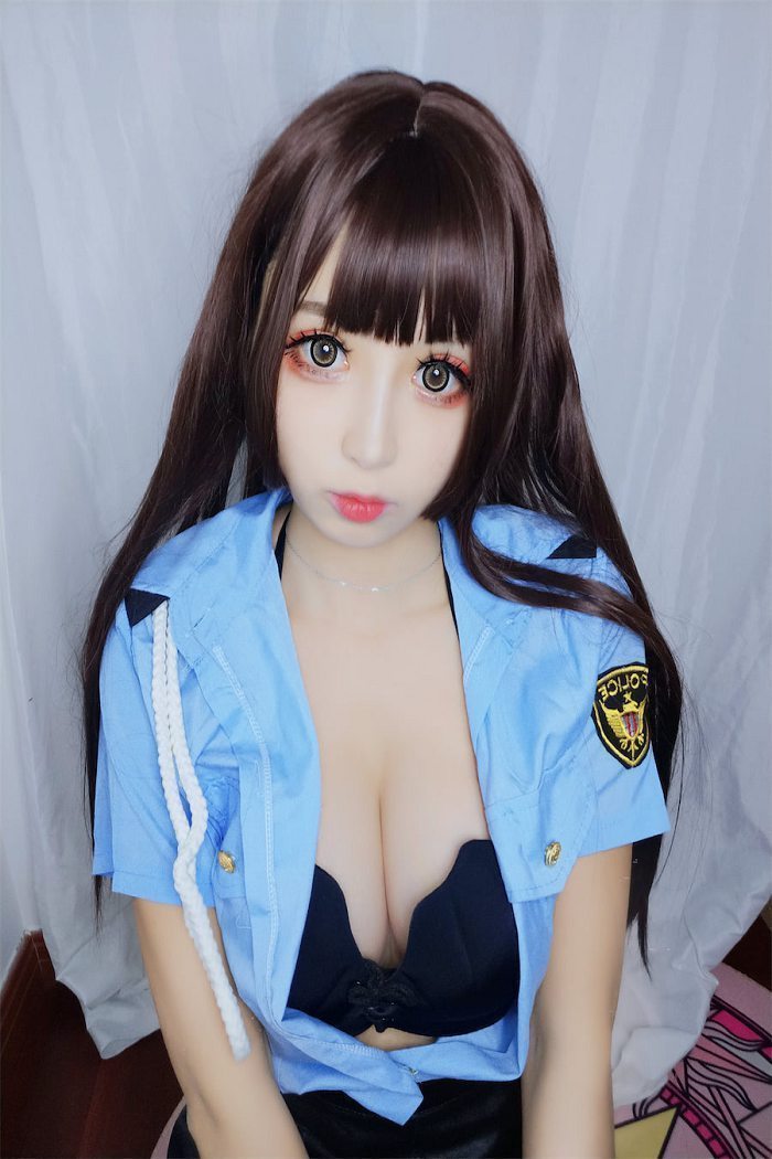 w黑米粥w 蓝色制服女警写真(2)