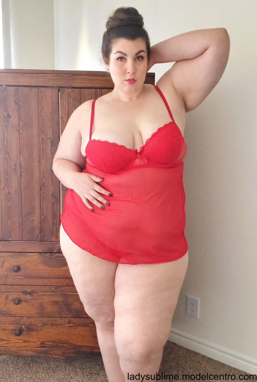 Fatty in a red negligee Lady Sublime flaunts her big juggs while sucking a toy(2)