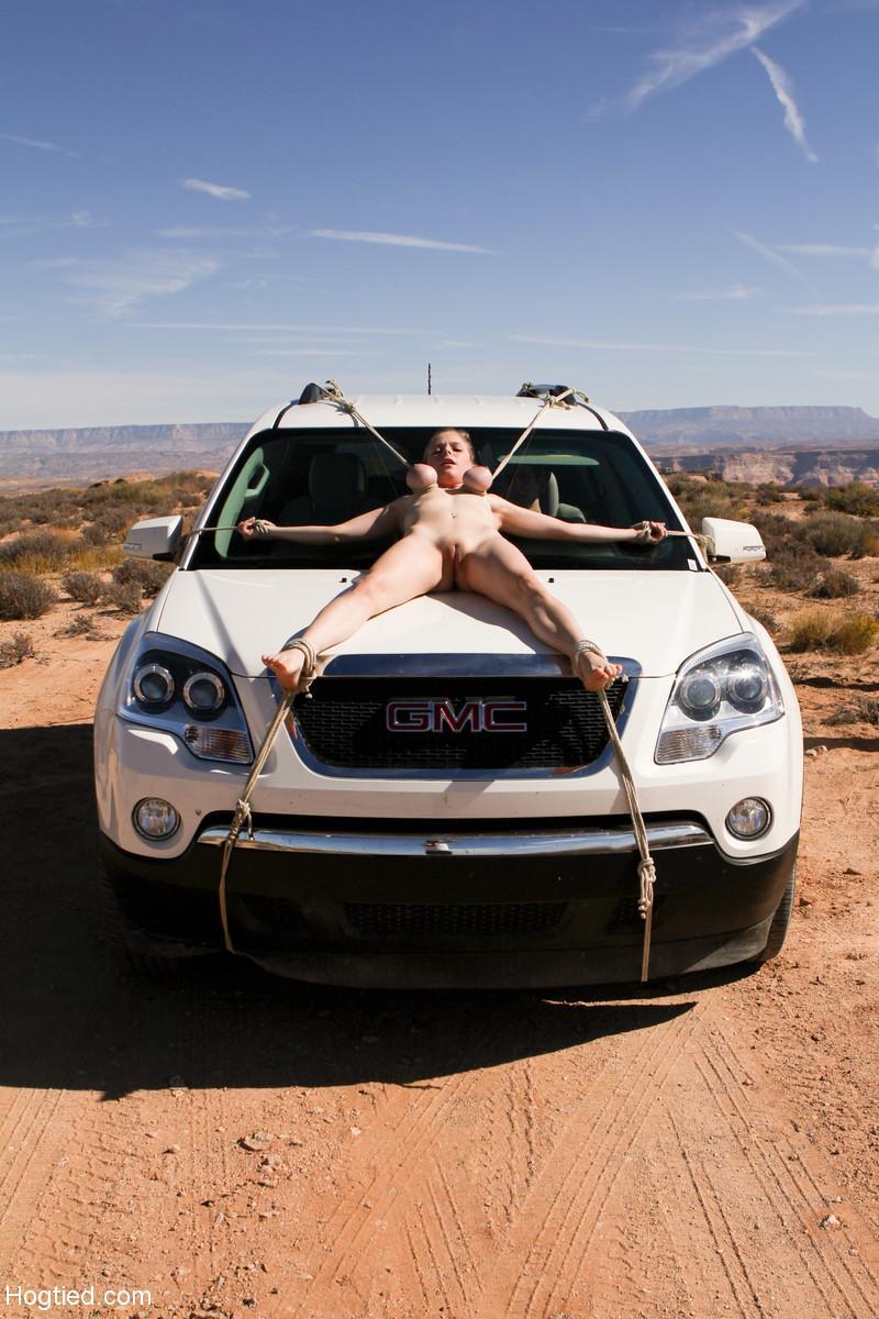 Naked Cherry Torn gets bound to a car & pulled by her big tits in the desert(2)