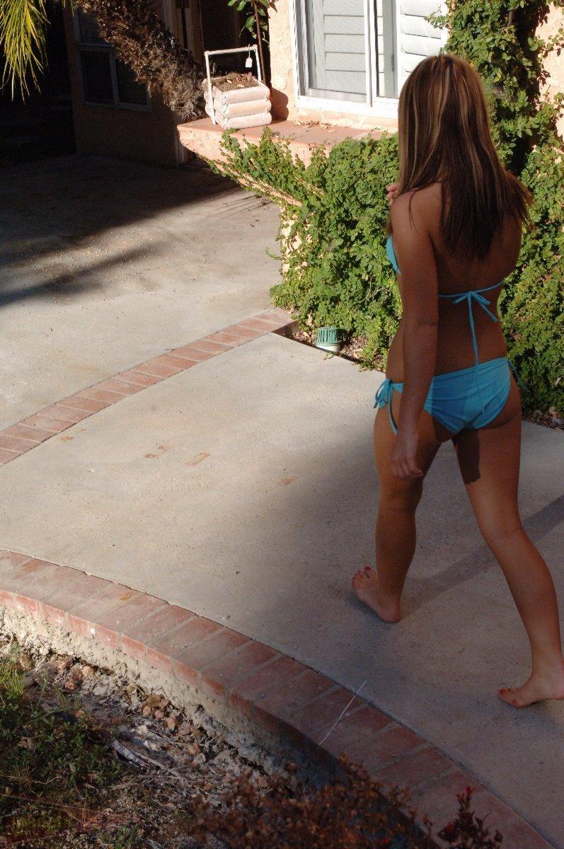 Dirty blonde chick Mc Kensie step outside her house in a string bikini(8)