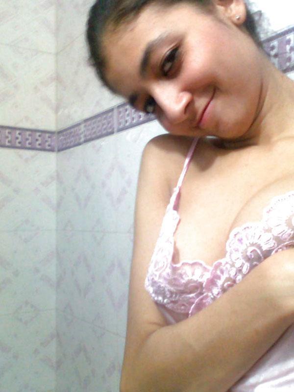 Indian solo girl holds her face firm while letting nipples free of lingerie(9)