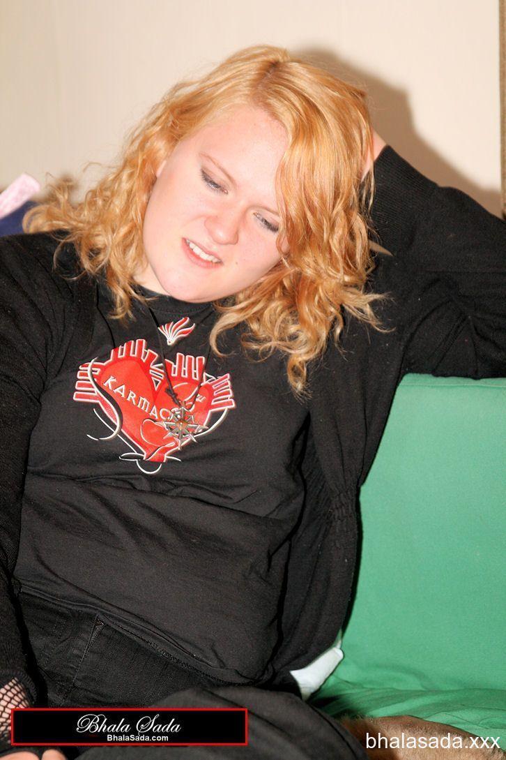 Redheaded fatty strips her sweatshirt and shows her cleavage in a black bra(6)