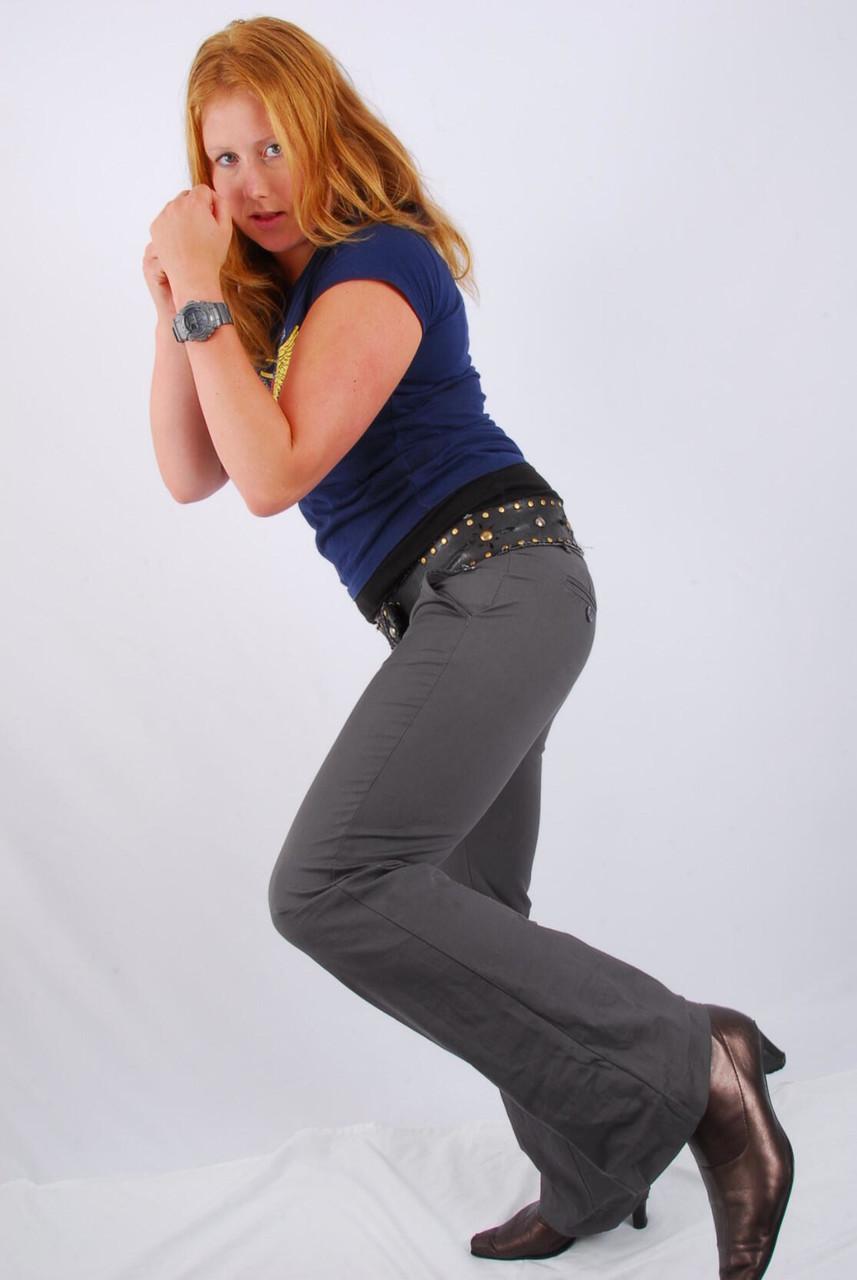 Natural redhead Judy displays her grey G-Shock watch in a T-shirt and jeans(7)