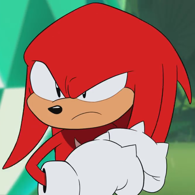 image of Knuckles the echidna, fiercely holding his mits together and looking to the left