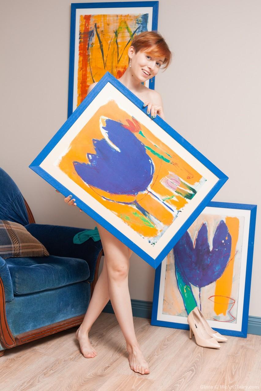 Hairy lady Ginta shows a collection of her paintings and spreads her pussy(20)