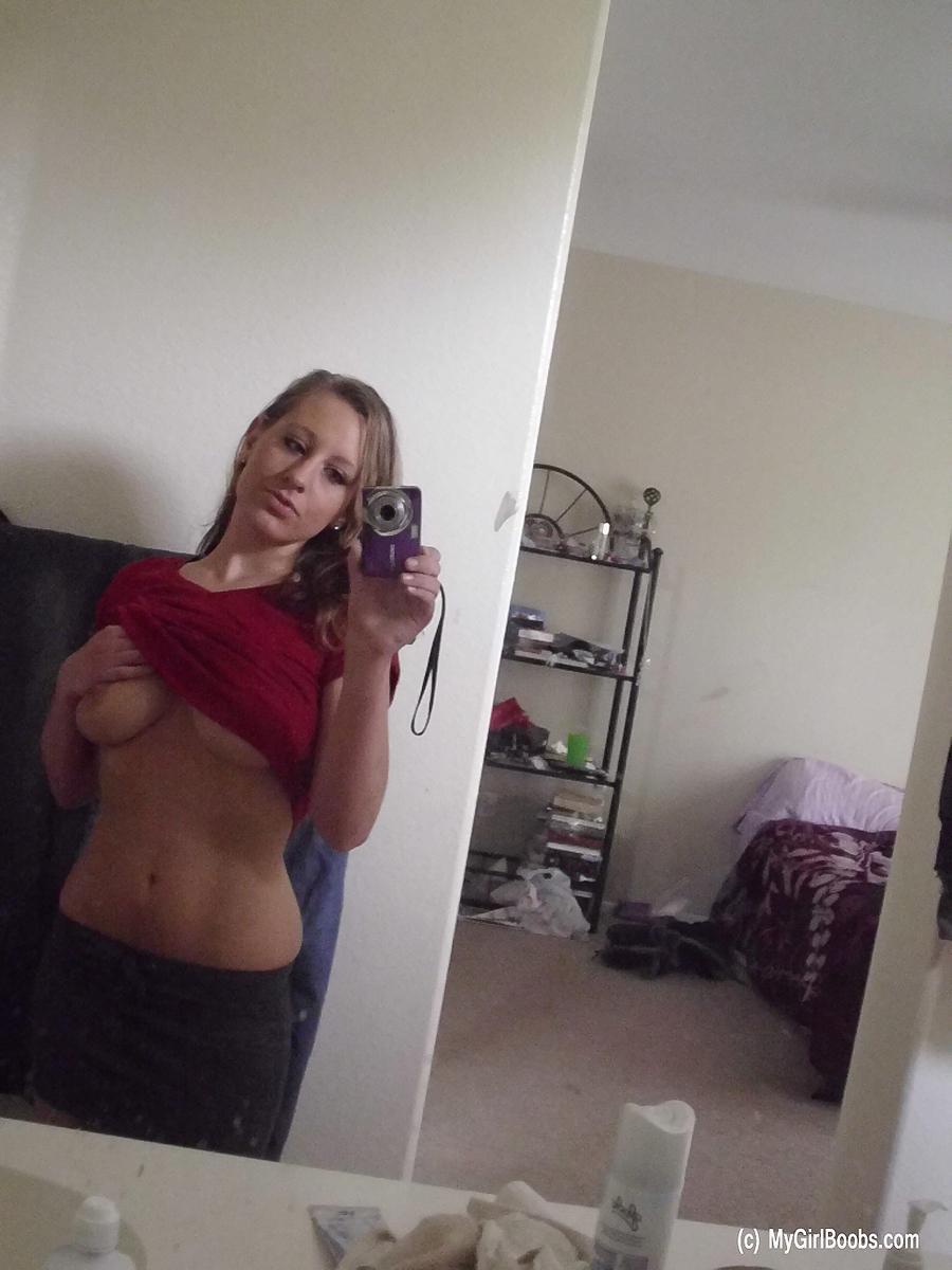 Busty amateur Lizzy takes self shots of her boobs and booty in a mirror(6)