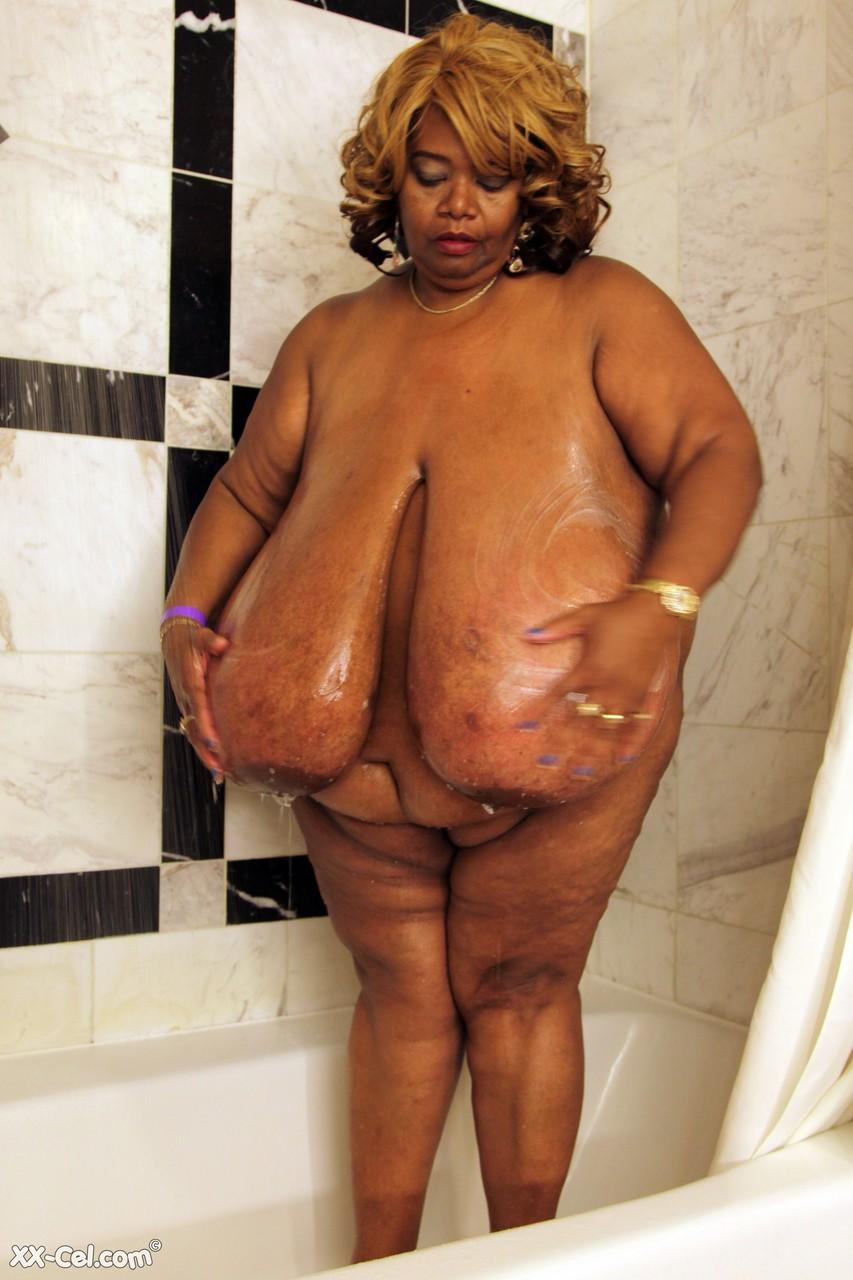 Mature ebony BBW Norma Stitz washing her giant natural tits in the shower(14)