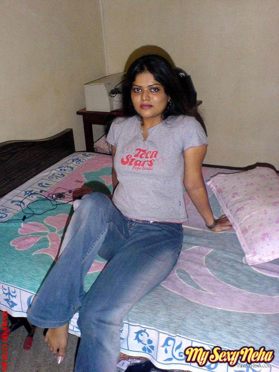 Petite Indian girl uncups big naturals after removing blue jeans(5)