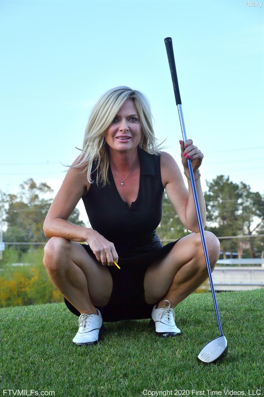 Seductress Hilary flashes her panties & shows her cleavage while playing golf(3)