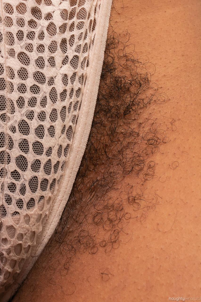 Curvaceous amateur Erykah Ohms displays her exotic hairy pussy up close(5)