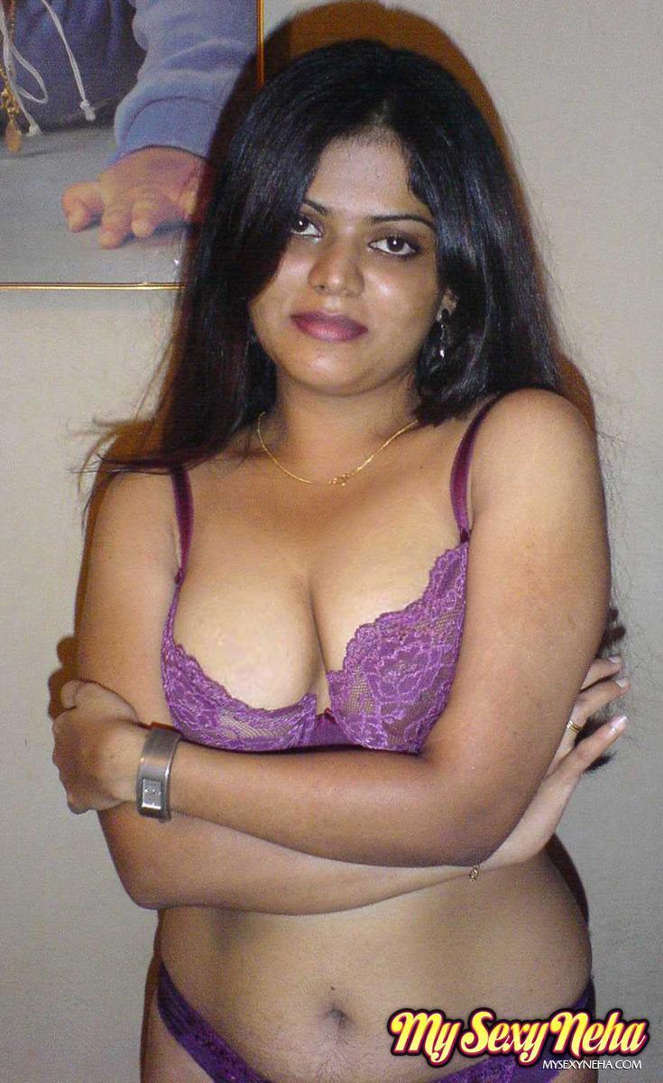 Petite Indian girl uncups big naturals after removing blue jeans(11)