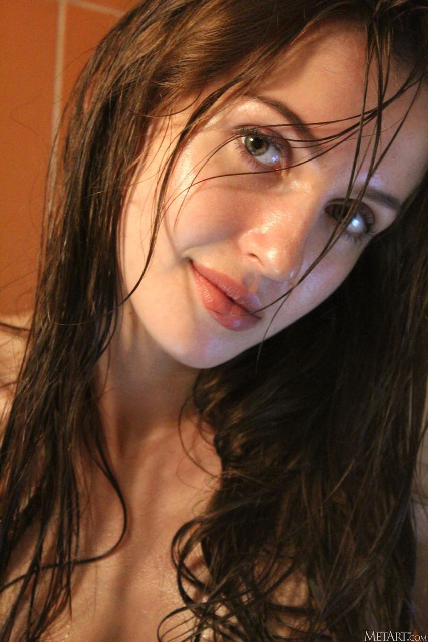 Brunette teen Holly Haim strips & washes her big tits in the shower(15)