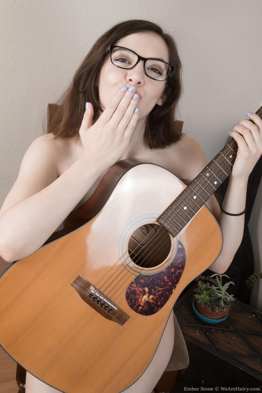 Naughty guitar hottie Ember Stone reveals her hairy body parts & fuzzy cunt(17)