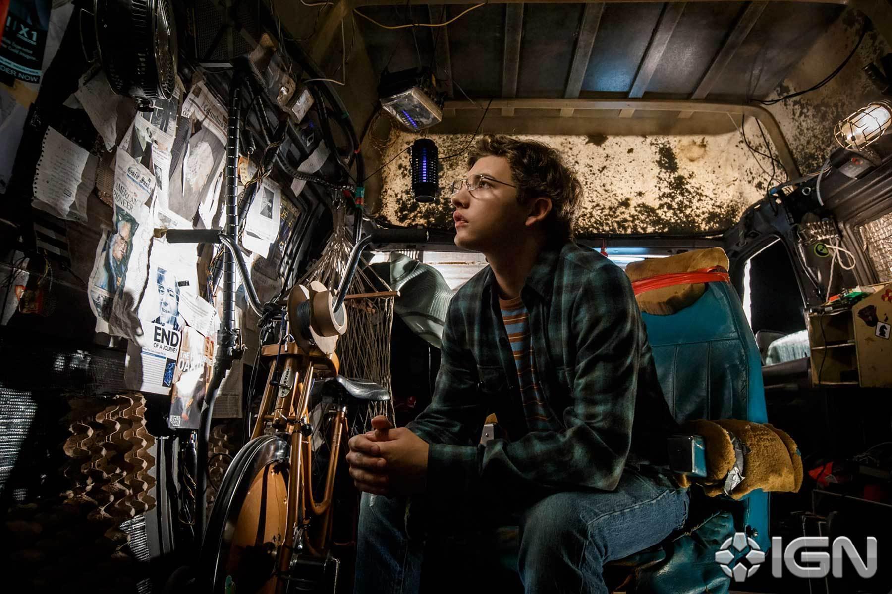 Ready Player One Wade Watts Does Some Easter Egg Research In A Cool New Photo