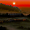 A passenger train crossing fields at dusk.