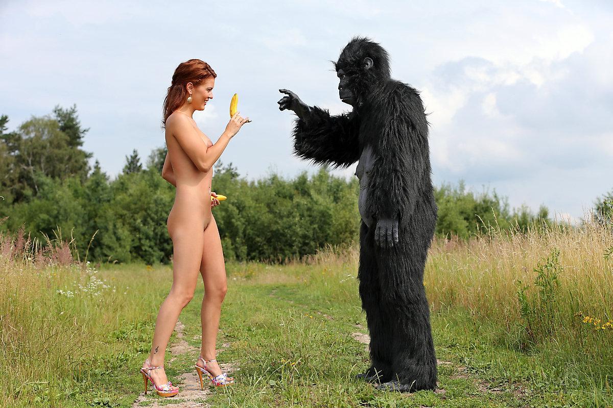 Sexy redhead cosplay chick Becca romps nude outdoors in heels with gorilla(4)