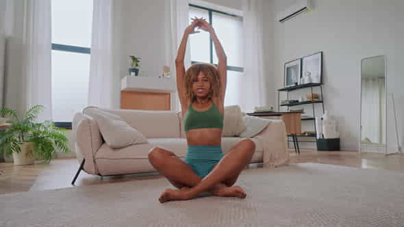 Woman Sitting On Floor In Living Room - VideoHive 51100714