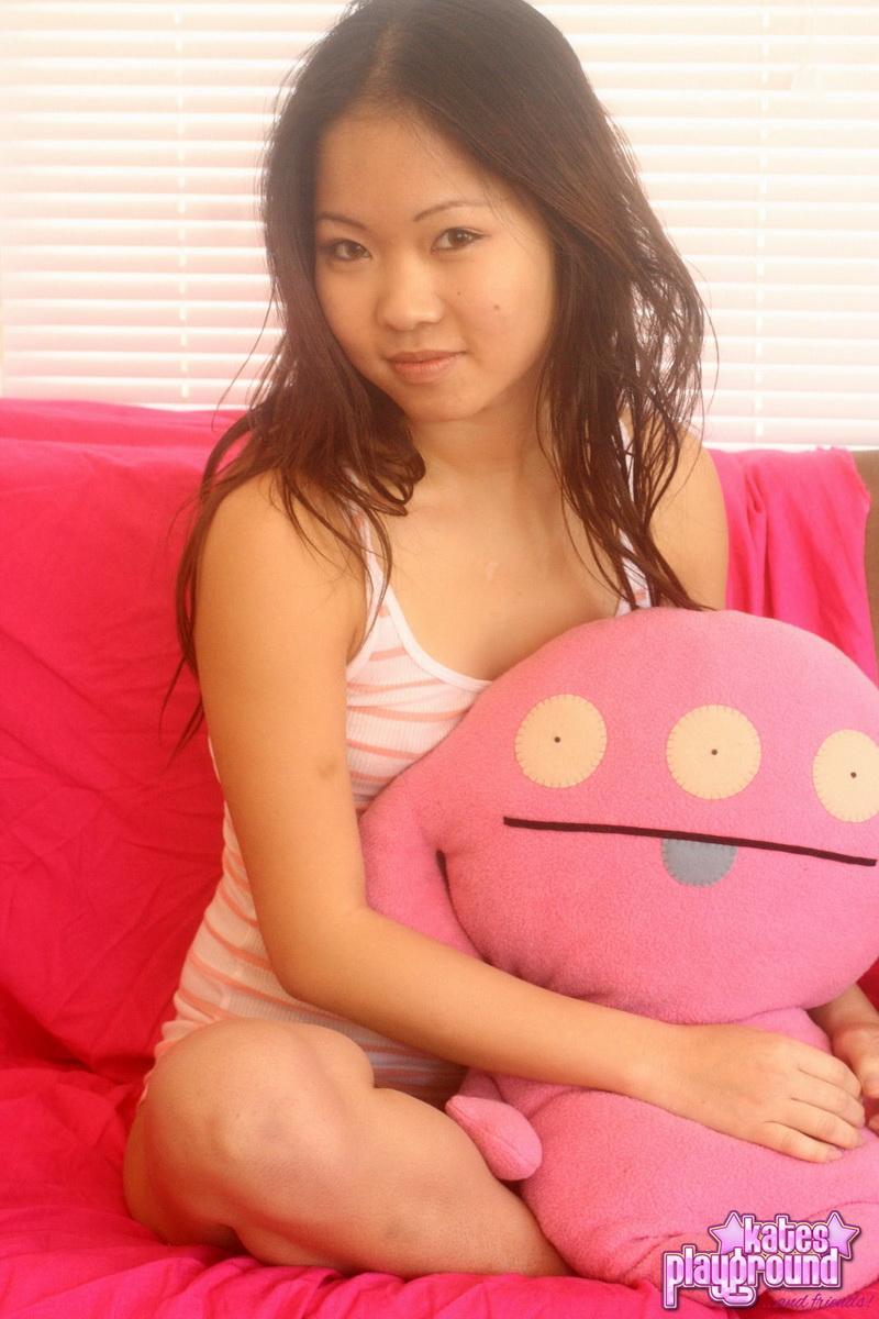 Delicious Asian teen Grace bends over and shows off her perfect tiny ass(1)