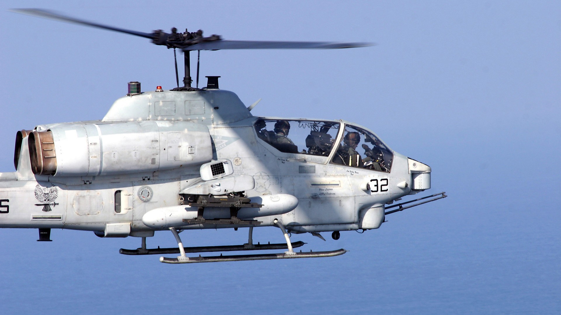 US_Navy_050405-M-1195M-013_An_AH-1W_Super_Cobra_assigned_to_Golden_Eagles_of_HMM-162,_provides_security_for_the_USS_Kearsarge_(LHD_3)_Expeditionary_Strike_Group_cr.jpg