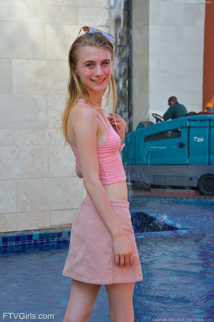 Slim 18 year old Sharlotte flashes her naked pussy in public places(6)