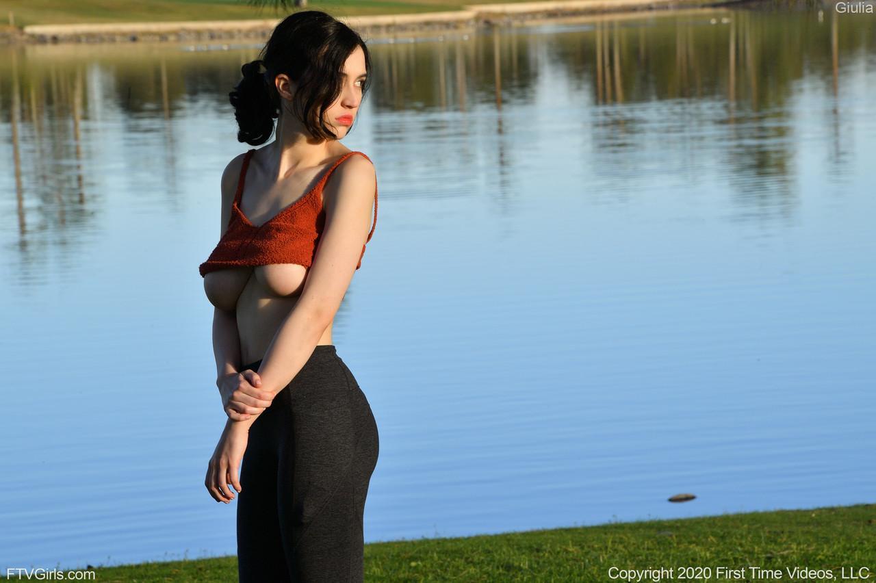 Glamorous Giulia exposes her big breasts while teasing in yoga pants outdoors(15)