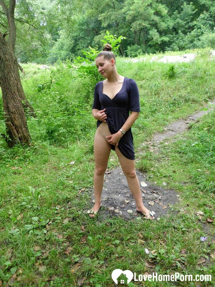 Alluring amateur exposes & plays with her horny shaved pussy outdoors(16)