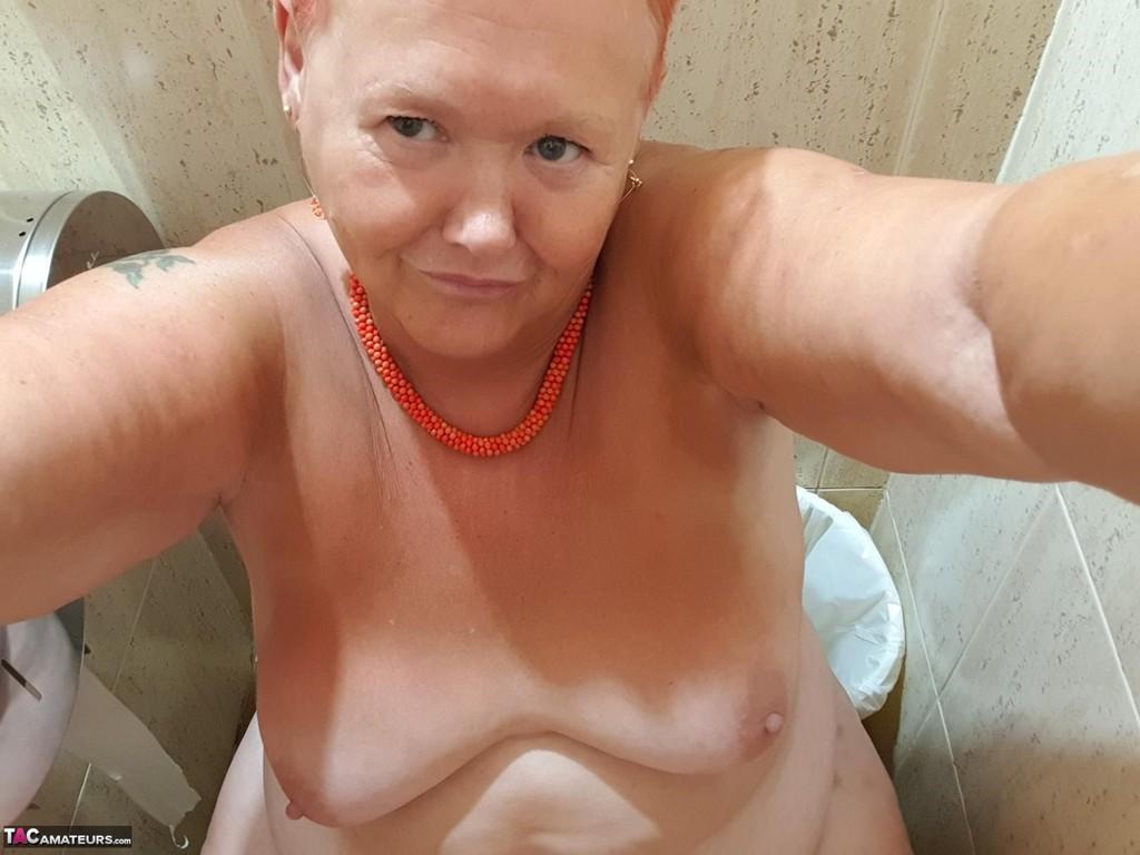 Fat granny with red hair Valgasmic Exposed takes naked selfies at home(12)