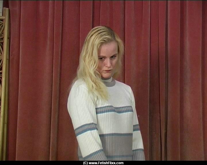 Blonde teen has her bare ass turned red during a caning session(1)