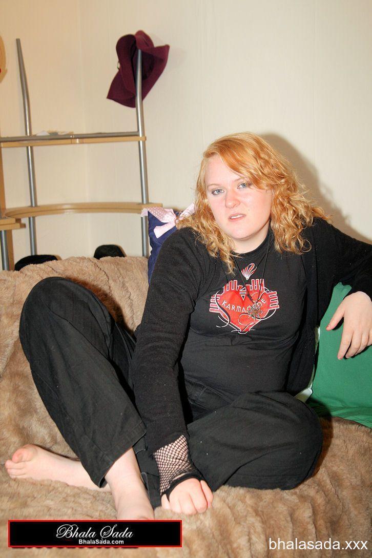 Redheaded fatty strips her sweatshirt and shows her cleavage in a black bra(4)