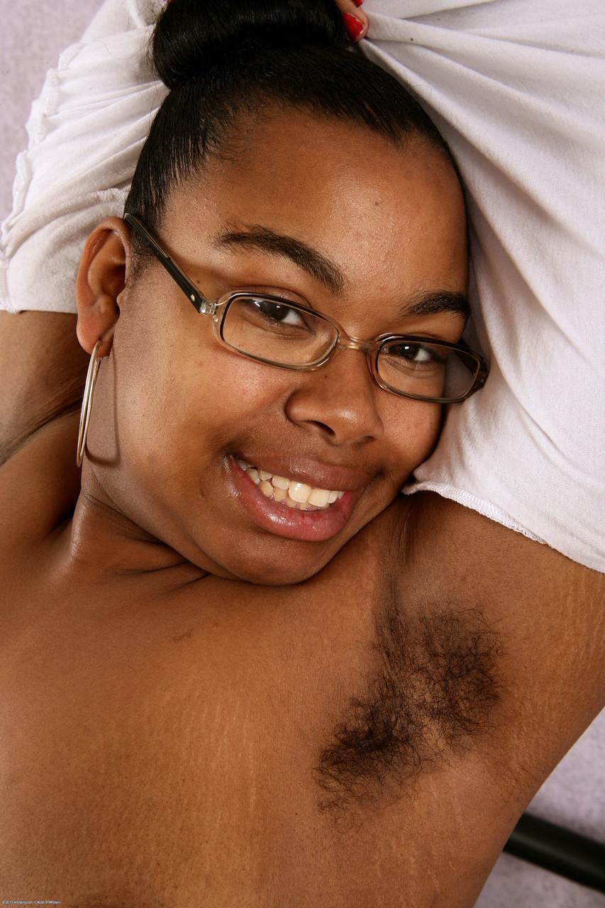 Cute nerdy ebony Monica Jimenez exposes her chubby body and hairy pussy(7)