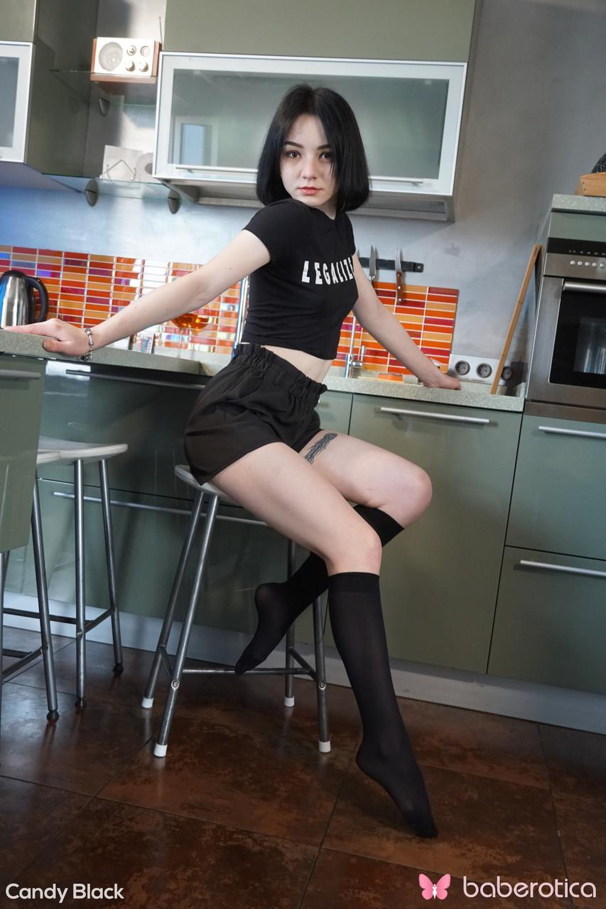 Dark haired teen Candy Black masturbates with a vibrator in black knee socks(1)