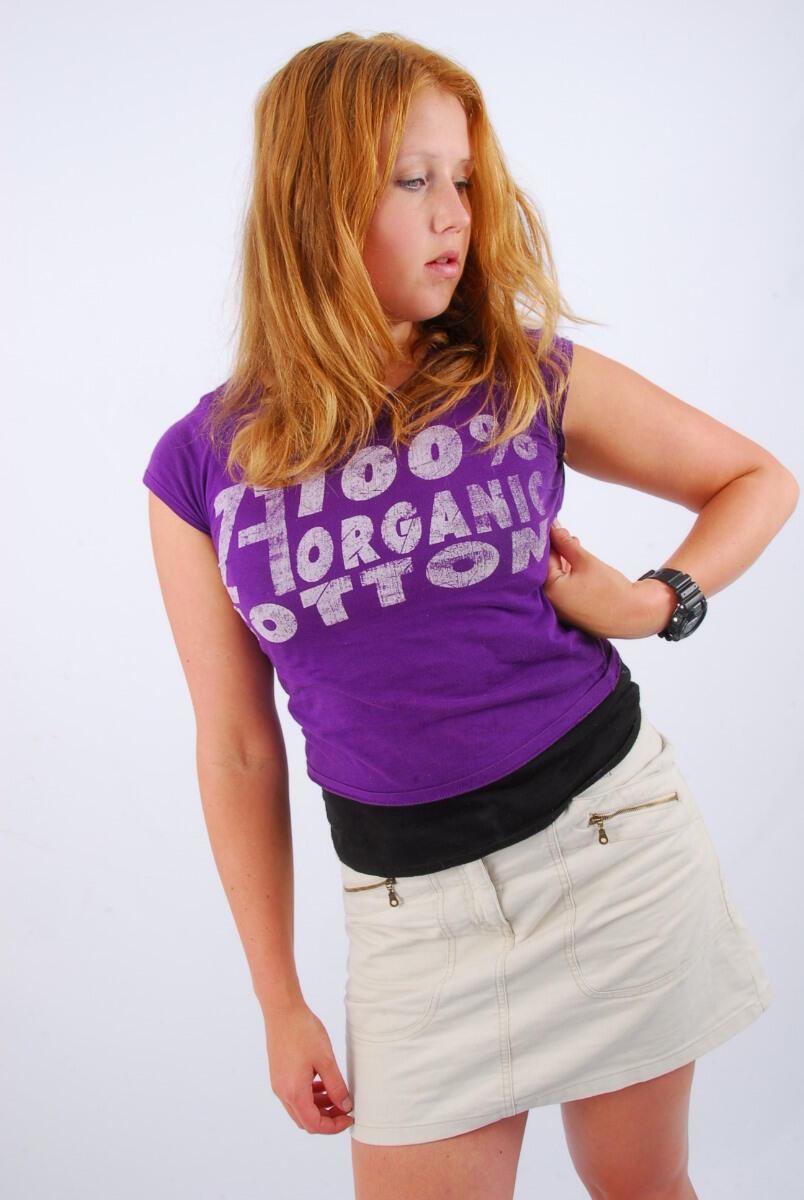 Natural redhead Judy models a black G-Shock watch while fully clothed(16)