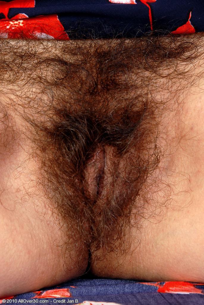 Old big breasted granny takes off her skirt and shows off her old hairy muff.(6)