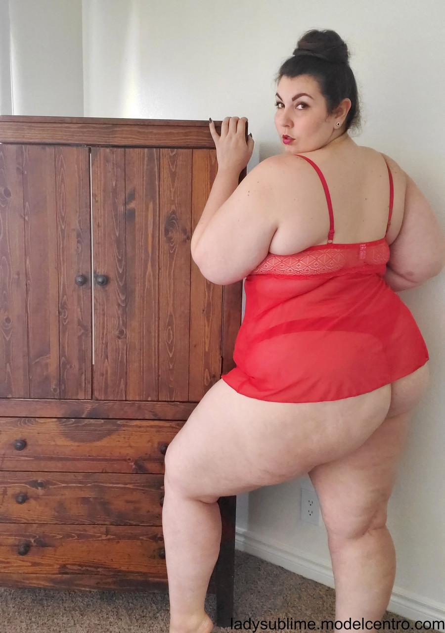 Fatty in a red negligee Lady Sublime flaunts her big juggs while sucking a toy(1)