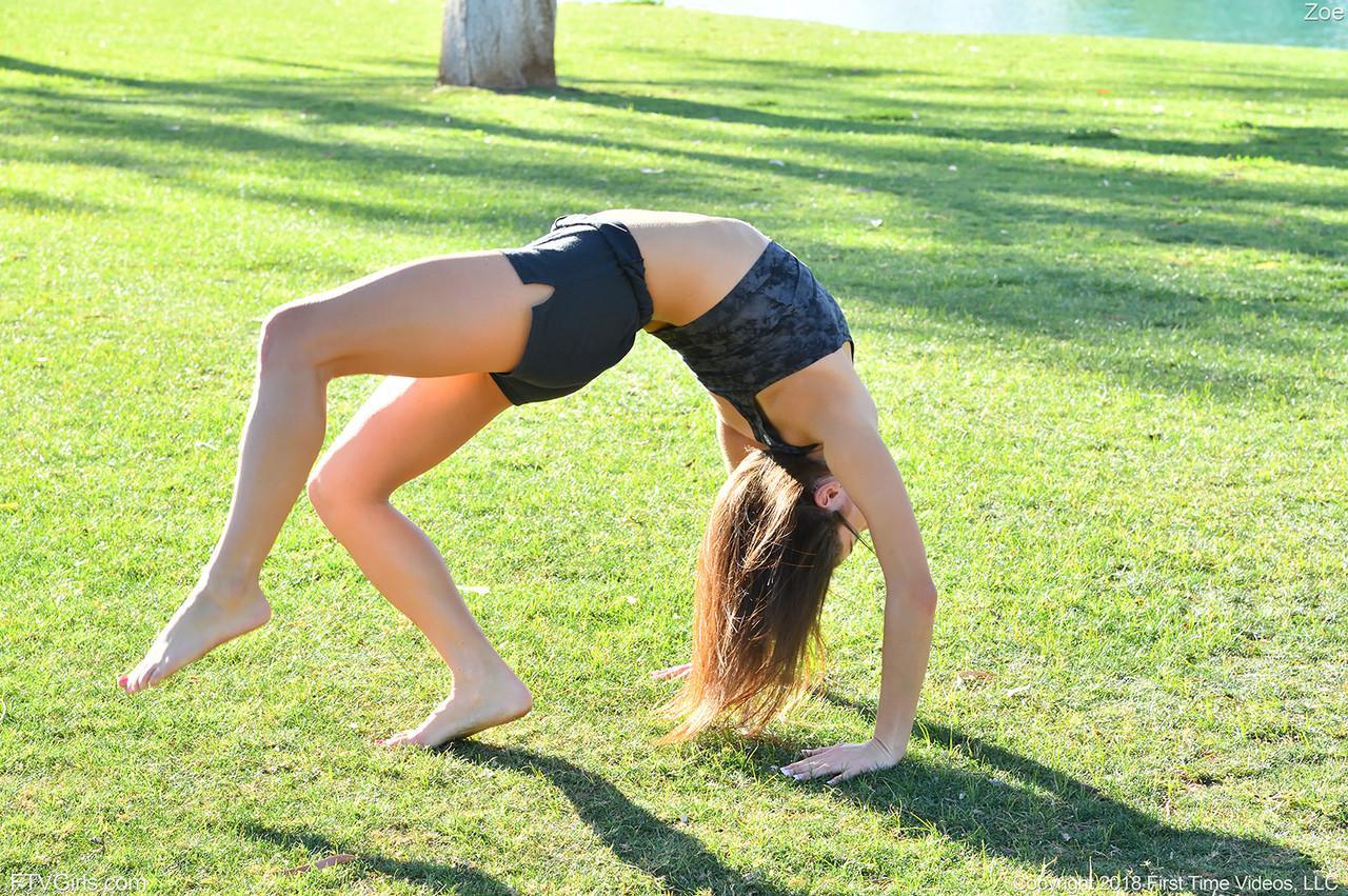 Teenage hottie in sexy outfit Zoe doing exercise outdoors by the water(3)