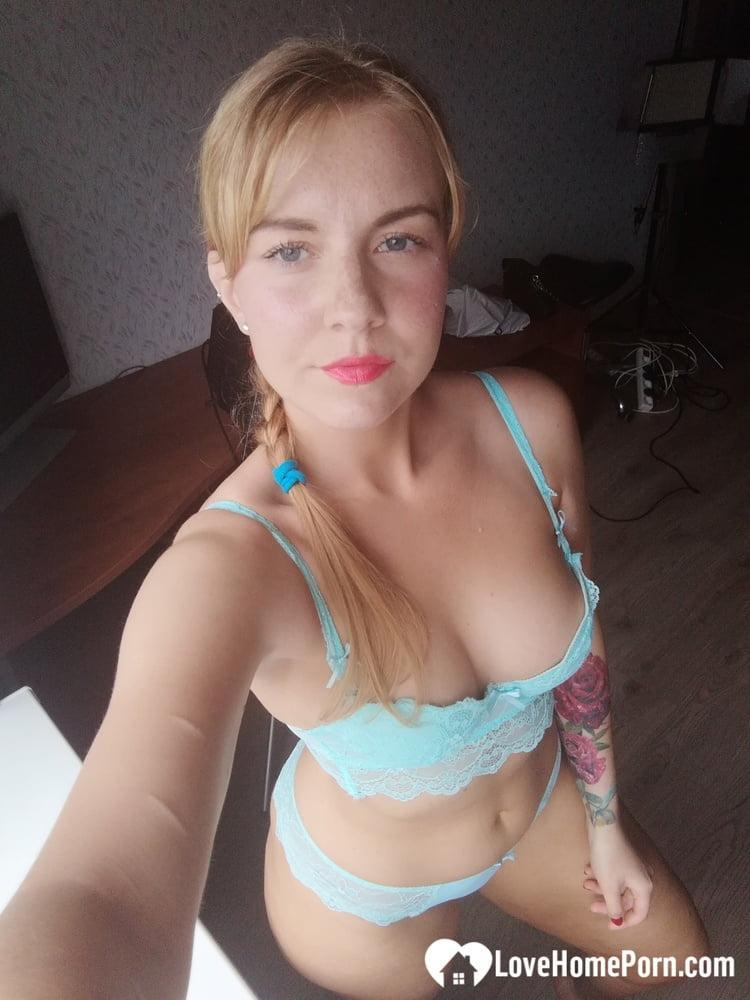 Beautiful amateur doll takes selfies while posing in her turquoise lingerie(7)