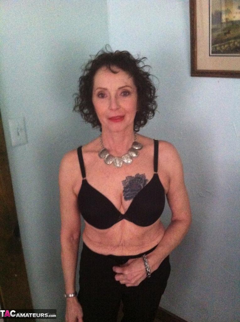 Curly haired mature woman likes sending her younger partner provocative photos(8)