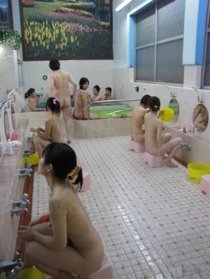 Gorgeous Japanese babes enjoying rough group sex action at the spa