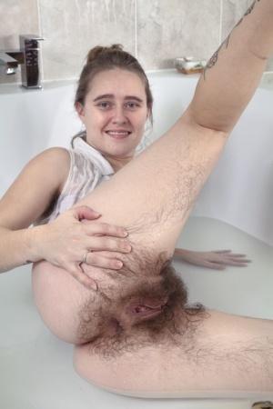 Charming beauty Bubsy Lou showing off her hairy holes in the bathtub