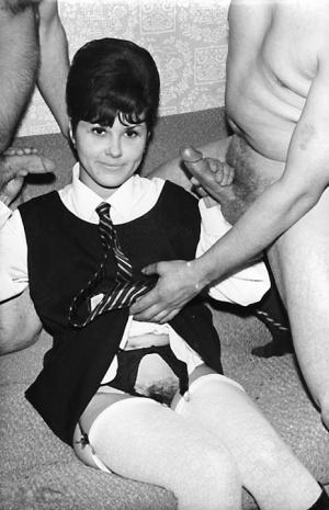 Small titted vintage schoolgirl removes her uniform for a big cock threesome