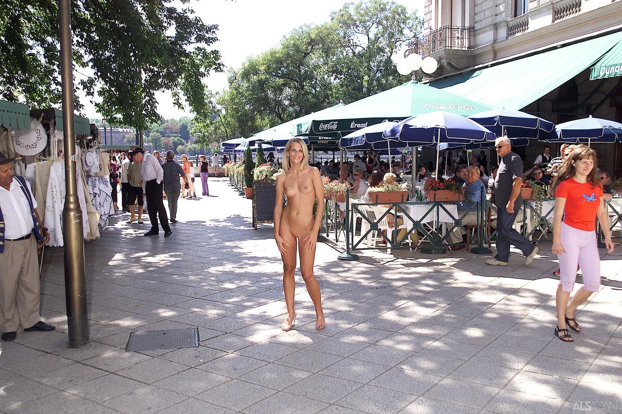 Blonde teen Krisztina removes her yellow dress and flaunts her body in public(18)