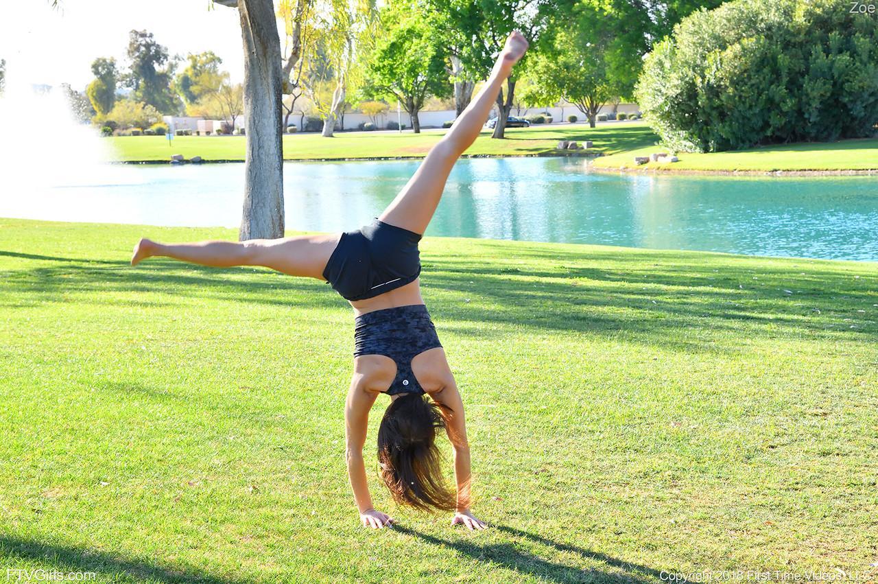 Teenage hottie in sexy outfit Zoe doing exercise outdoors by the water(4)